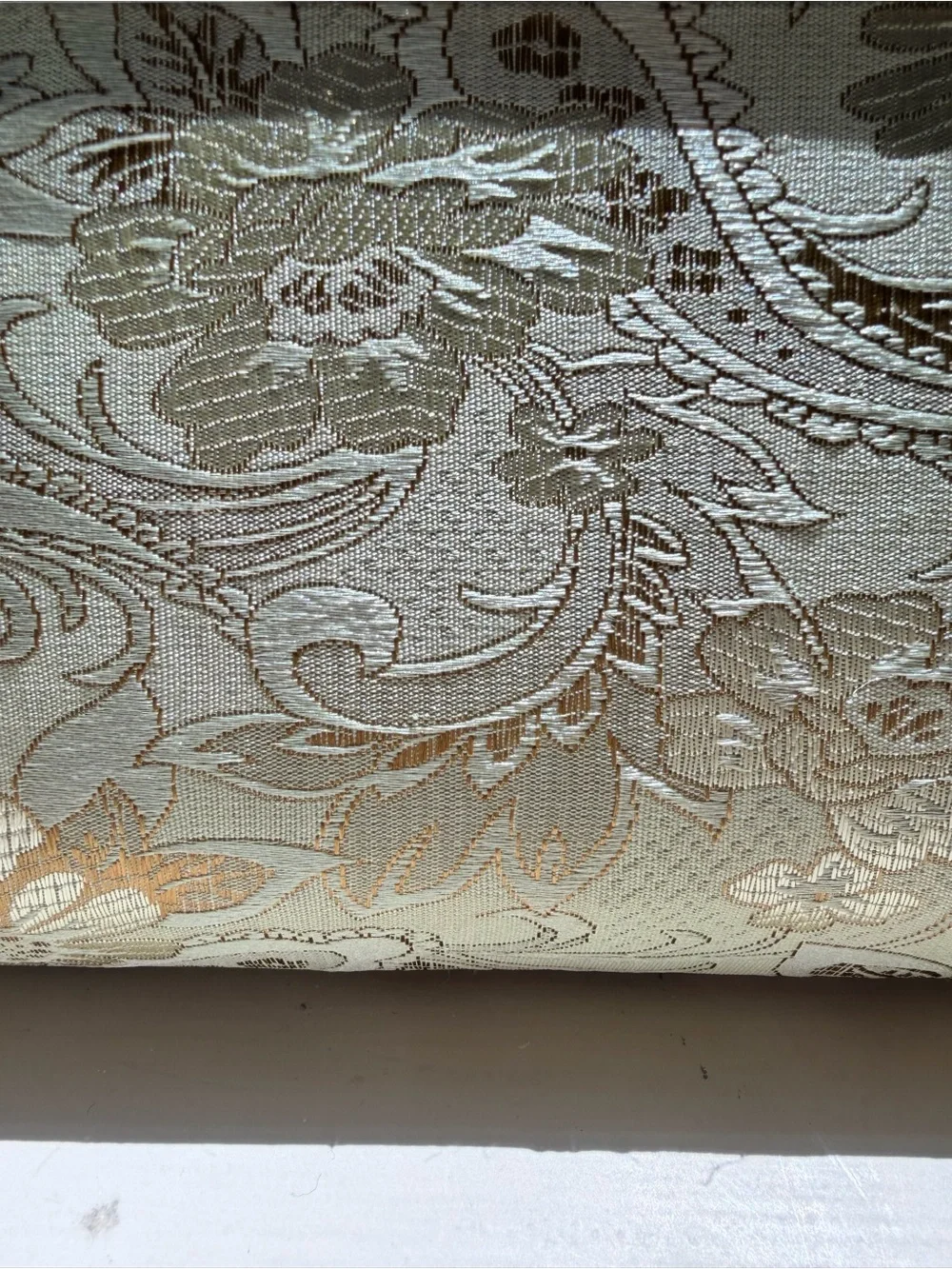 Viintage-style evening clutch features gold/green floral damask metal kiss lock